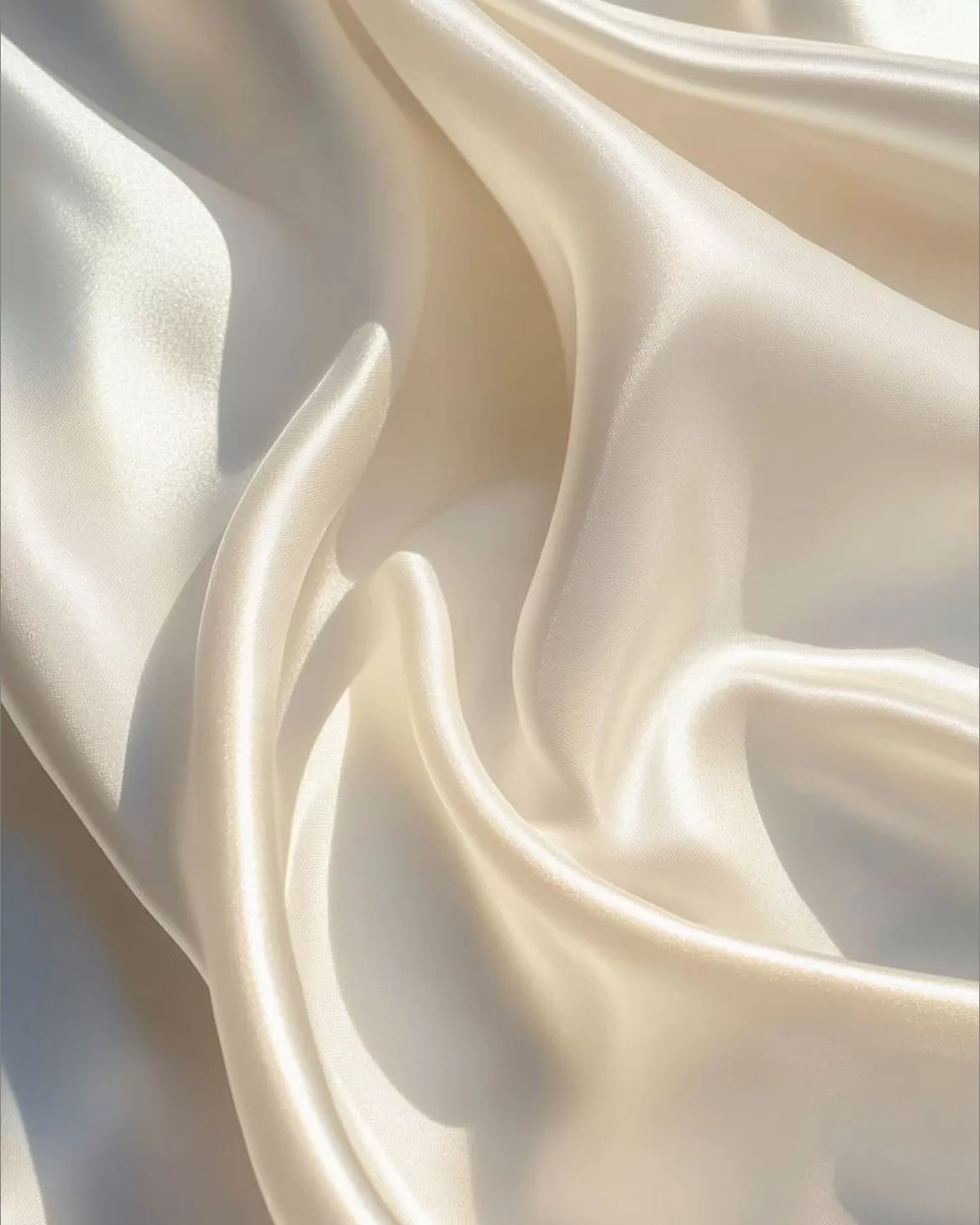Flowing soft cream colored fabric