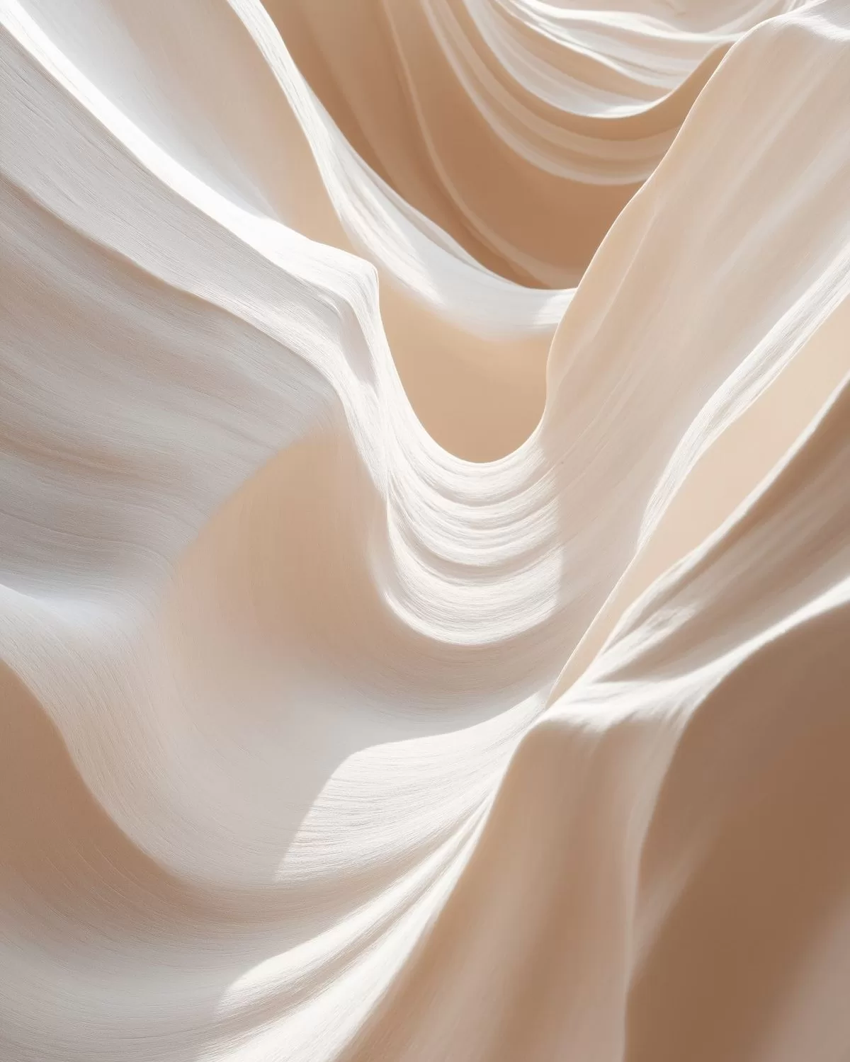 Smooth draped cream colored fabric with folds